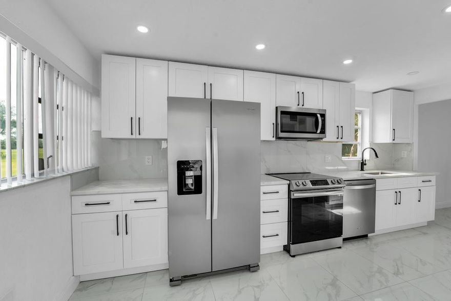Beautifully updated 2 bed, 2 bath corner unit condo on the first floor with serene lake and golf course views. Enjoy modern finishes throughout, an open-concept layout, and abundant natural light. Step outside to a peaceful walking and nature path just beyond your patio. This move-in ready home offers the perfect blend of comfort, style, and outdoor beauty—ideal for year-round living or a relaxing retreat.