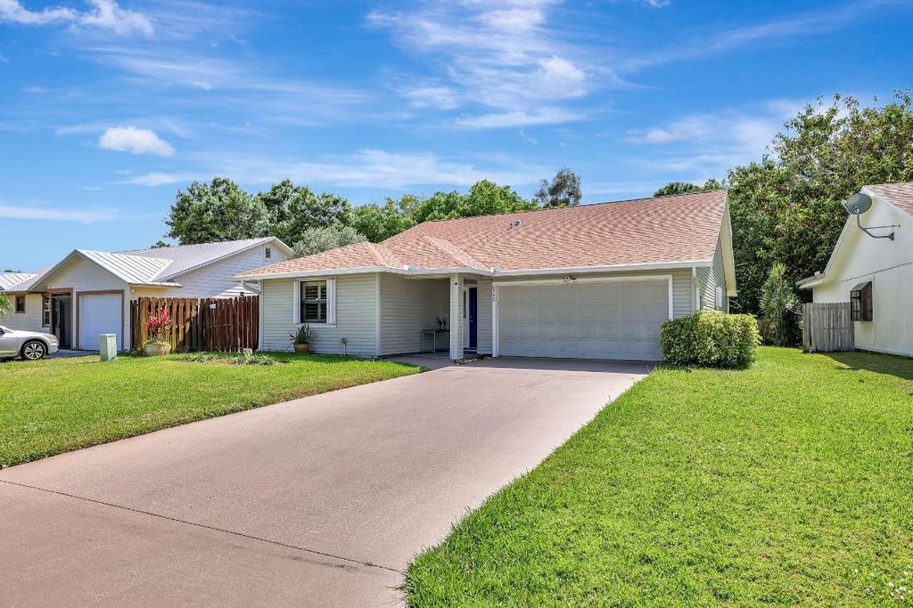 Photo of 6750 SE Raintree Avenue, Stuart, FL 34997 (MLS # R10980651)