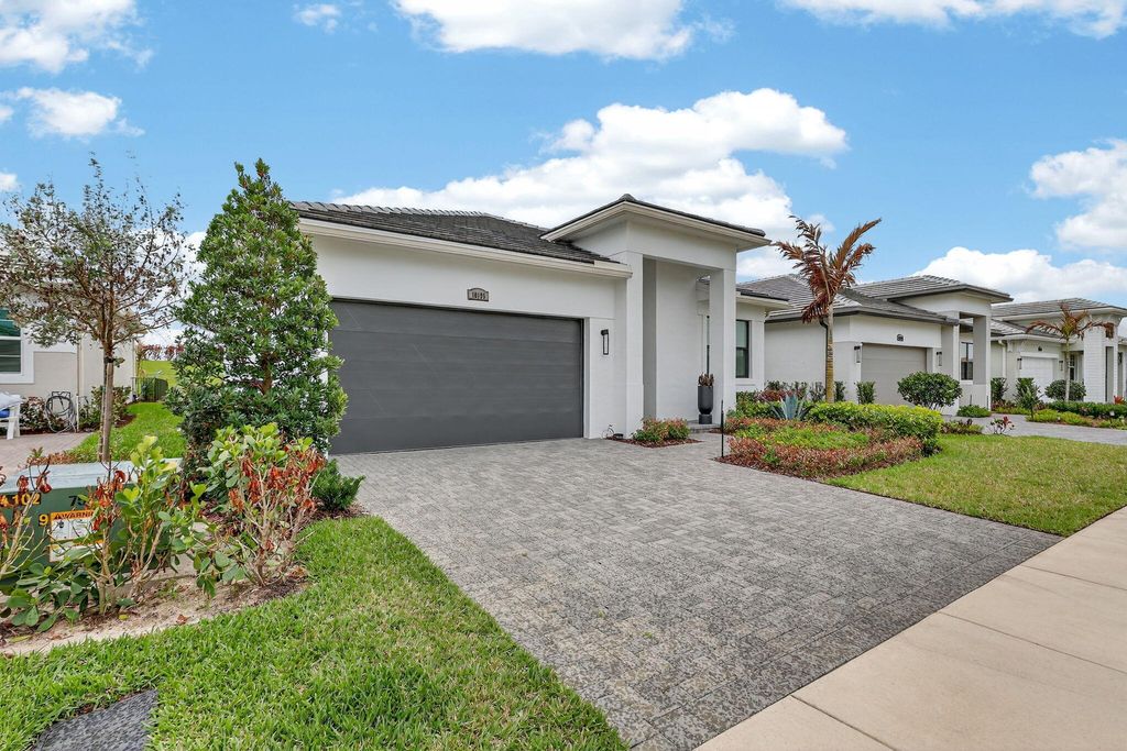 Photo of 10195 SW Latium Way, Port Saint Lucie, FL 34987 (MLS # B26002167)