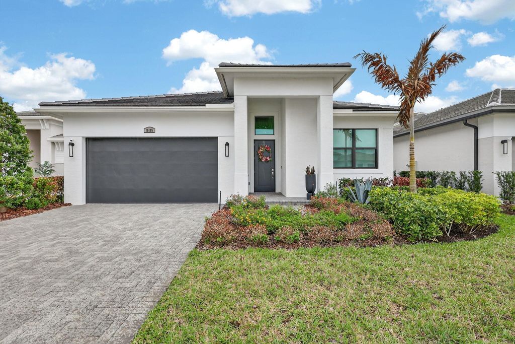 Photo of 10195 SW Latium Way, Port Saint Lucie, FL 34987 (MLS # B26002167)
