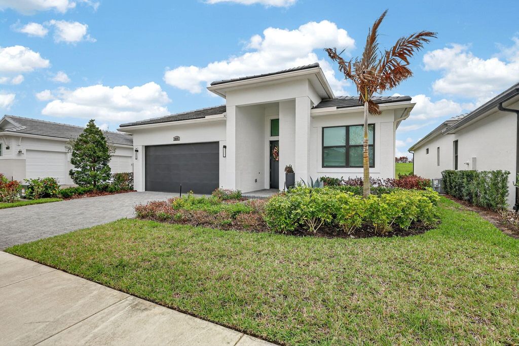 Photo of 10195 SW Latium Way, Port Saint Lucie, FL 34987 (MLS # B26002167)