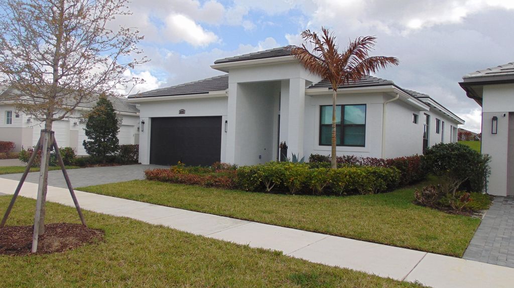 Photo of 10195 SW Latium Way, Port Saint Lucie, FL 34987 (MLS # B26002167)