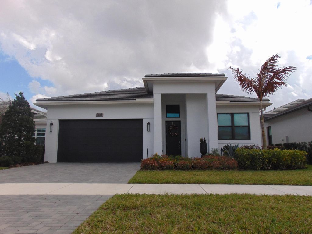 Photo of 10195 SW Latium Way, Port Saint Lucie, FL 34987 (MLS # B26002167)