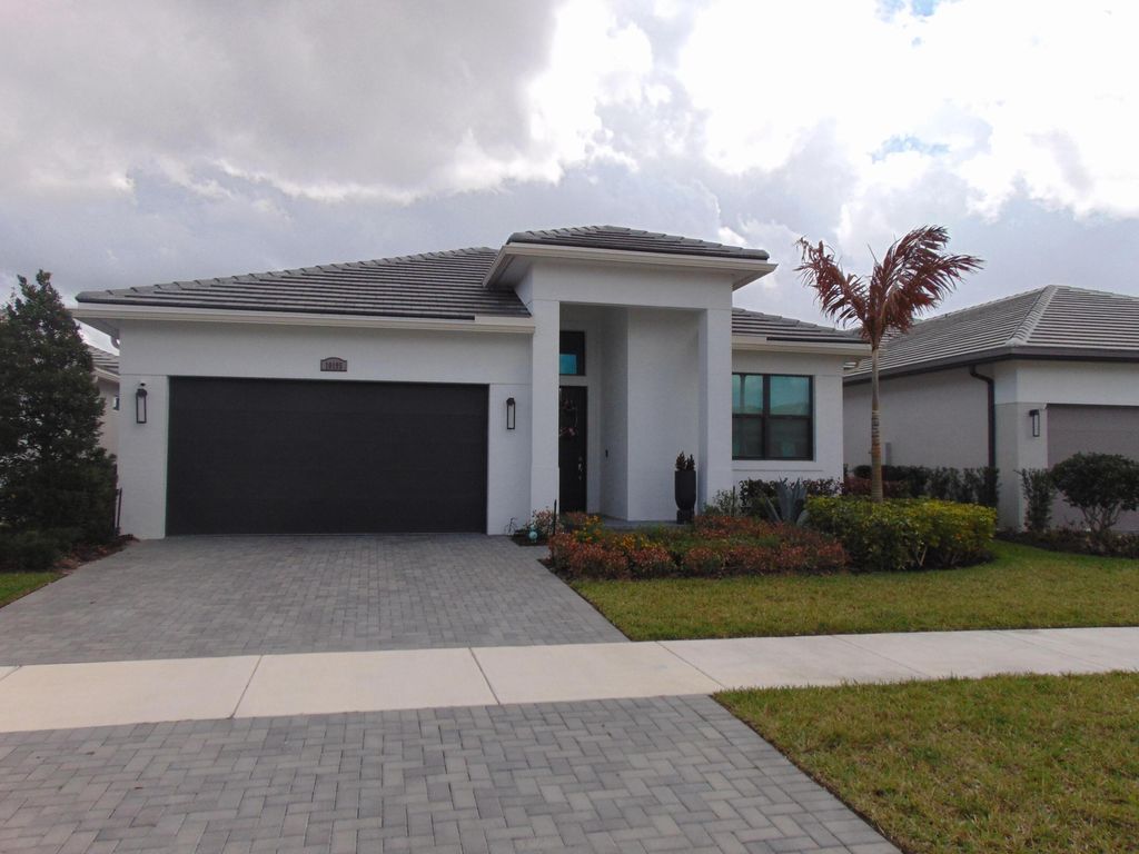 Photo of 10195 SW Latium Way, Port Saint Lucie, FL 34987 (MLS # B26002167)