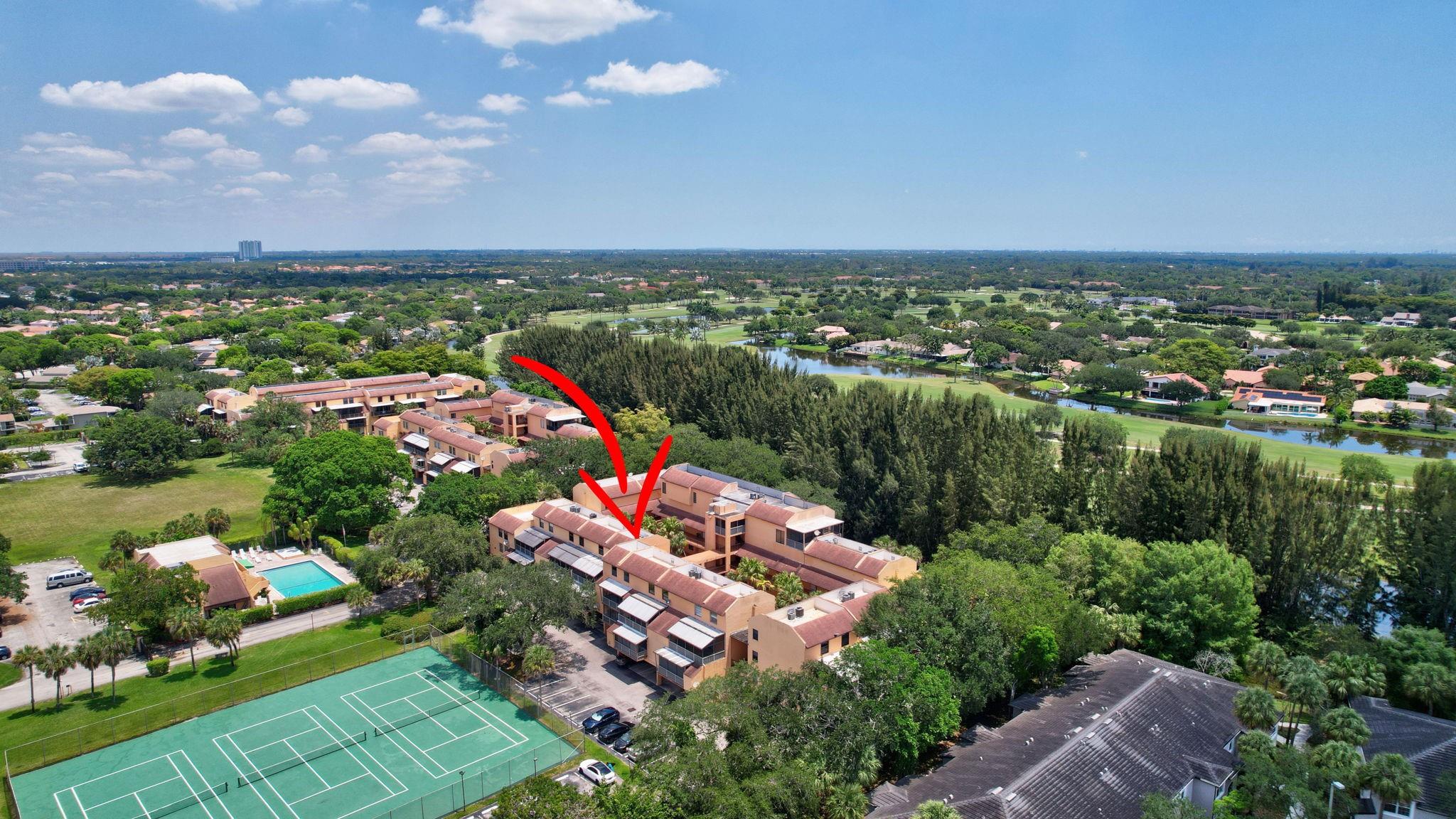 Spacious 2BR/2.5BA condo/townhouse with in-unit washer and dryer, vinyl flooring, and an updated master bathroom. Full hurricane protection with impact windows and shutters offers year-round peace of mind. Enjoy a large screened-in balcony with a 3’x6’ storage unit, plus corner covered parking for two vehicles - deeded to the unit. Community amenities include tennis courts, a fitness center, and a pool. 40 year inspection completed and only a small roof assessment is active, which will be paid by Seller upon closing. No other pending or upcoming assessments at this time!