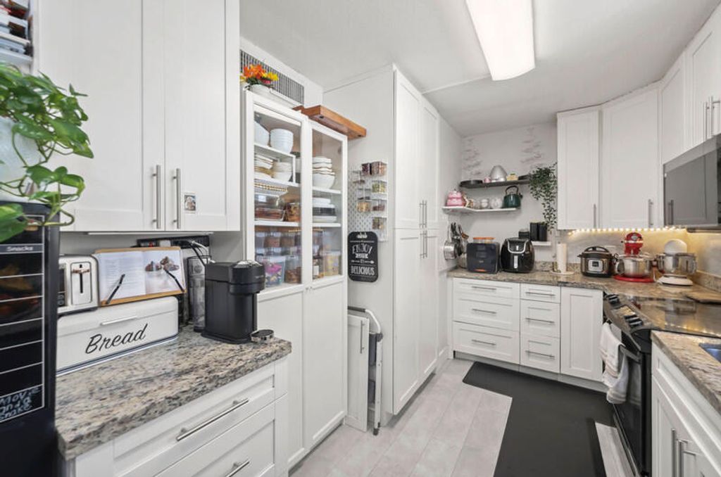 Photo of 8421 Forest Hills Drive #104, Coral Springs, FL 33065 (MLS # B26020646)