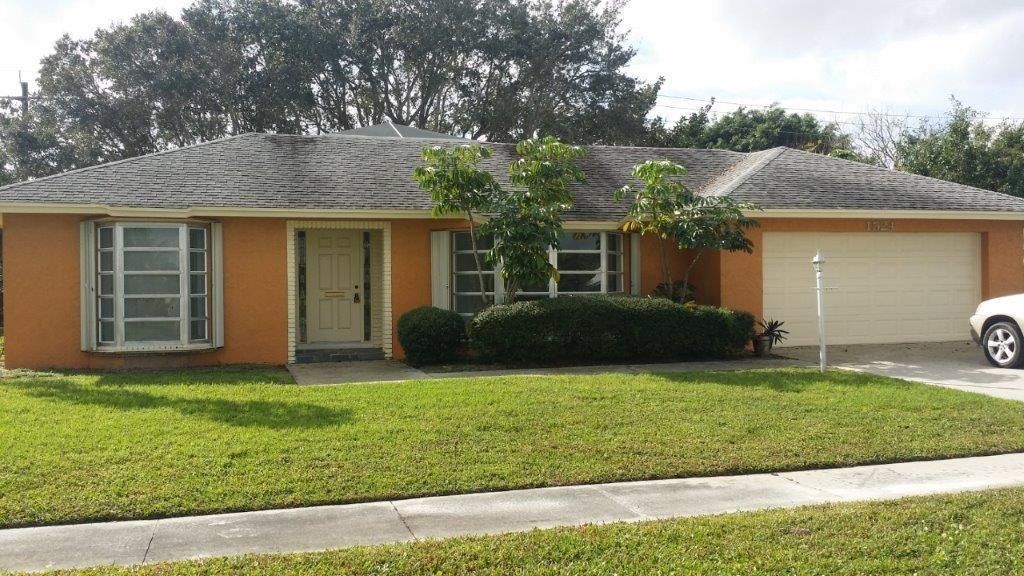 Photo of 1524 SE Sunshine Avenue, Port Saint Lucie, FL 34953 (MLS # R10742898)