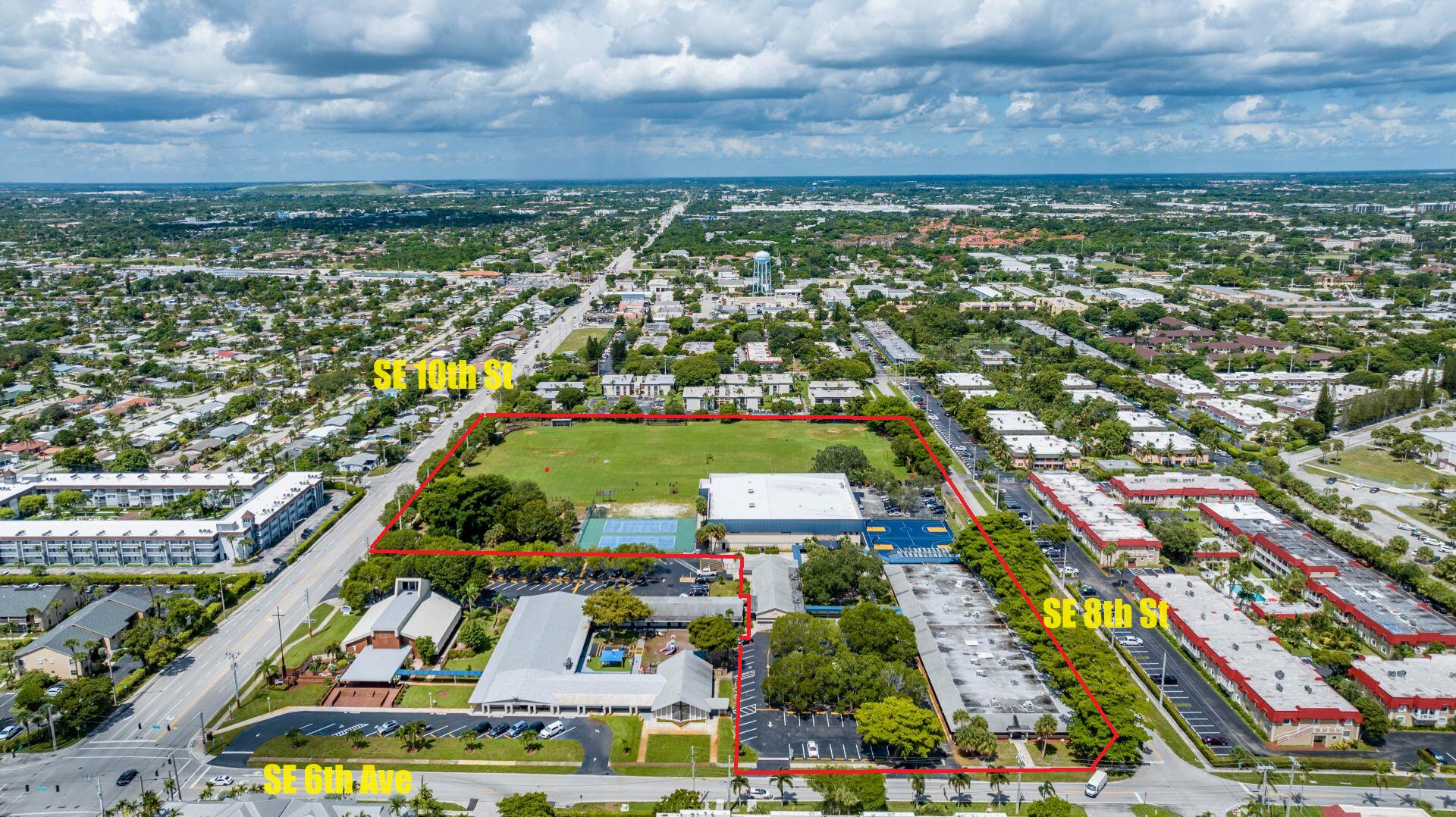 Extremely Rare Opportunity to purchase a +/- 10-acre High School campus in NE Broward County. 3 buildings totaling +/- 62,096 sf, + 1, 1440sf Portable building.Total of 35 classrooms including science & computer labs. 2-story gymnasium building with stage, cafeteria, commercial kitchen, offices, lounge, lockers, weight & training rooms, etc.Grounds have a football/soccer field, tennis, basketball and sand volleyball courts, baseball & softball diamonds and a playground/park. +/- 600 Student capacity. Over 570 ff on SE 10th St, signalized corner at SE 6th Ave. Minutes from many UHNW communities. Click on ''More'' for additional information.