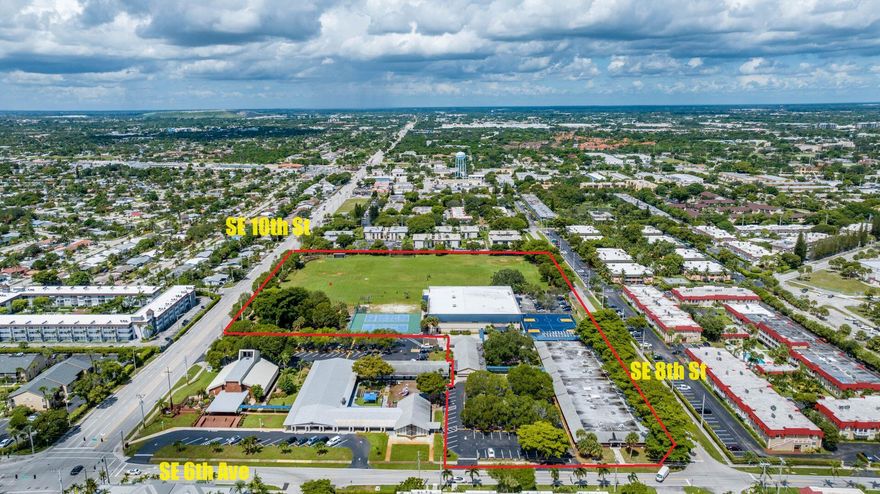 Extremely Rare Opportunity to purchase a +/- 10-acre High School campus in NE Broward County.  3  buildings totaling +/- 62,096 sf, + 1, 1440sf Portable building.Total of 35 classrooms including science & computer labs. 2-story gymnasium building with stage, cafeteria, commercial kitchen, offices, lounge, lockers, weight & training rooms,  etc.Grounds have a football/soccer field, tennis, basketball and sand volleyball courts, baseball & softball diamonds and a playground/park.  +/- 600 Student capacity. Over 570 ff on SE 10th St, signalized corner at SE 6th Ave. Minutes from many UHNW communities. Click on ''More'' for additional information.