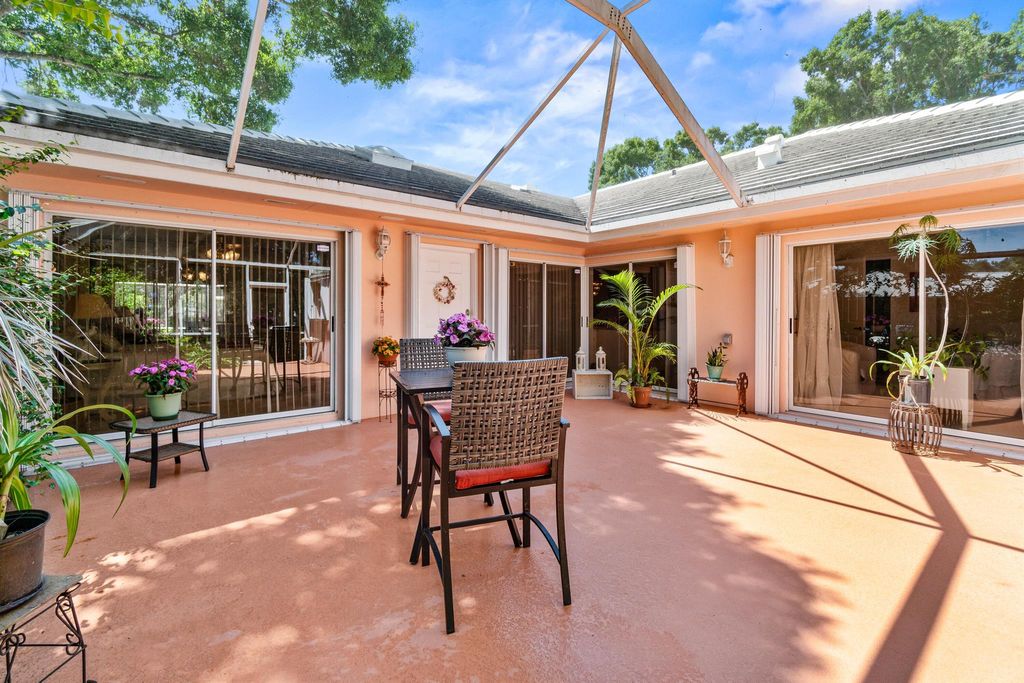 Photo of 1603 Springdale Court, Palm Beach Gardens, FL 33403 (MLS # R11089606)