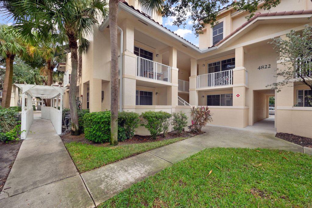 Photo of 4822 Chancellor Drive #22, Jupiter, FL 33458 (MLS # R10936309)