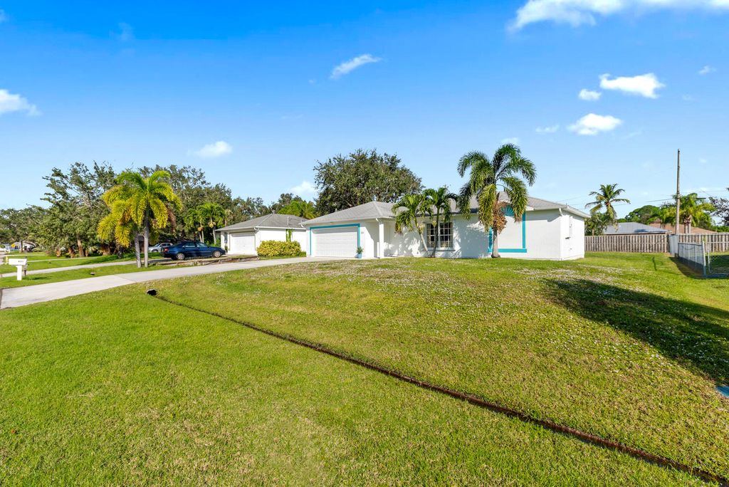 Photo of 631 SW Aster Road, Port Saint Lucie, FL 34953 (MLS # R10849285)