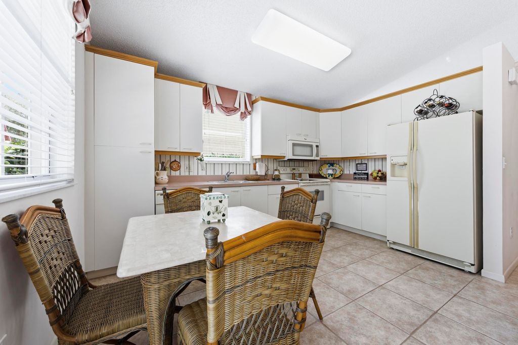 Photo of 7954 Rockport Circle, Lake Worth Beach, FL 33467 (MLS # R11165078)