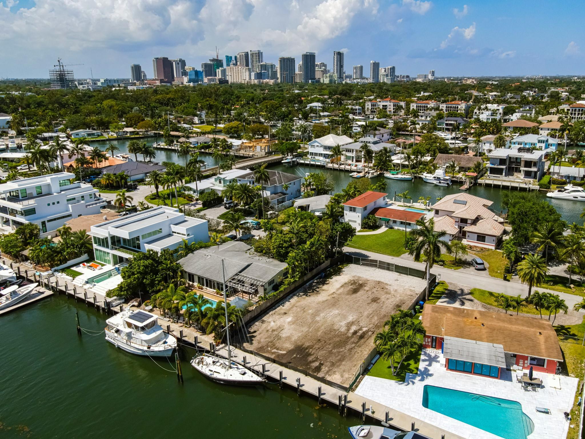 NO FIXED BRIDGES! Enjoy 70 feet of waterfront on the south side of the street with direct, unrestricted ocean access—just minutes to open water. This south-facing property offers refreshing breezes and is ideally located near the beach, international airport, downtown, shopping, and major highways. Build your dream home here!
The property is being sold AS-IS, and plans are included in the sale. The land is vacant and fully fenced.
DO NOT WALK THE PROPERTY. Agents must accompany all buyers. NO ShowingTime requests—please call or text to schedule.