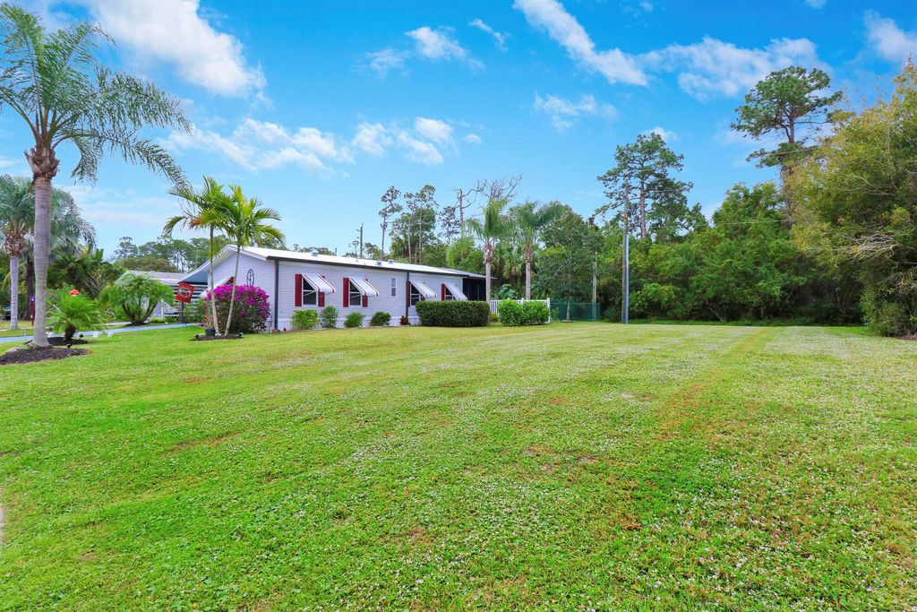 Photo of 2456 SW Olds Place, Stuart, FL 34997 (MLS # R10948184)