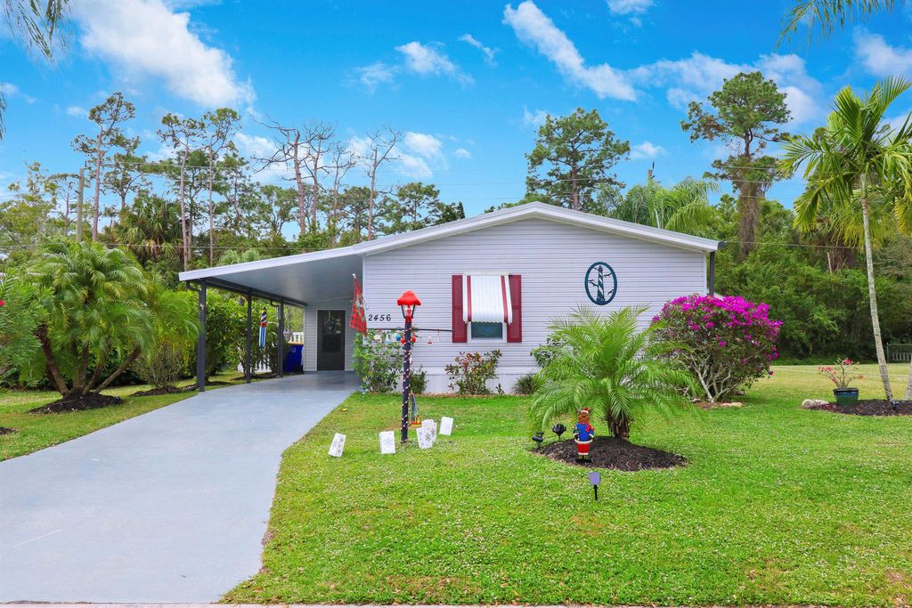 Photo of 2456 SW Olds Place, Stuart, FL 34997 (MLS # R10948184)