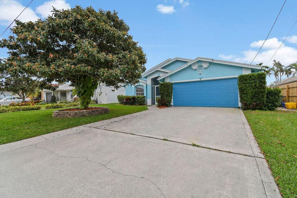 Photo of 6180 Dania Street, Jupiter, FL 33458 (MLS # R10779616)