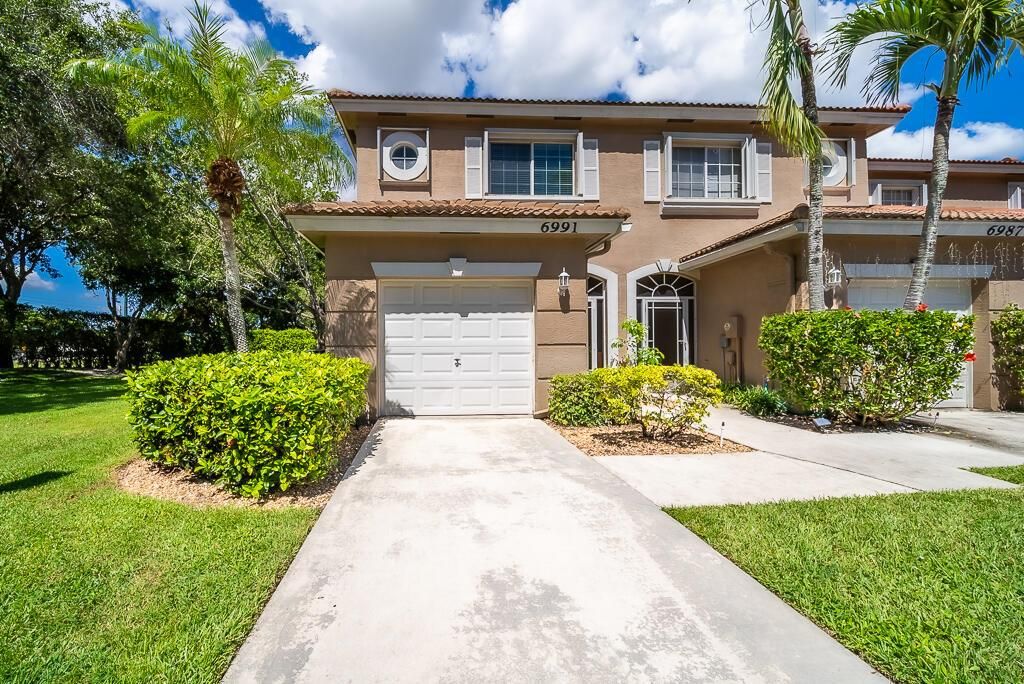 Photo of 6991 Oak Bridge Lane, Lake Worth, FL 33467 (MLS # R11117764)