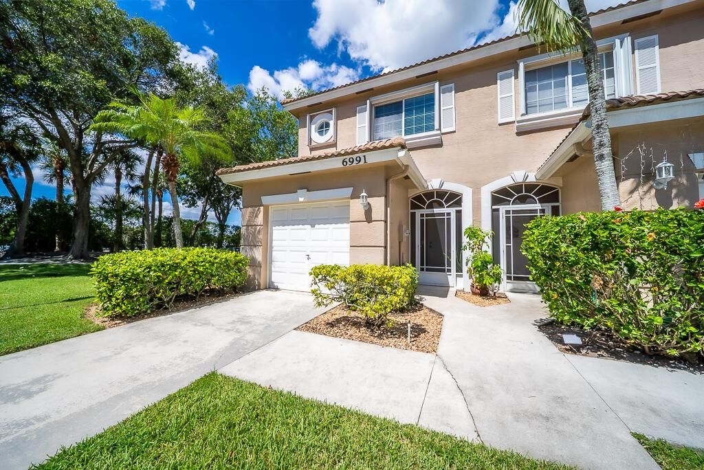 Photo of 6991 Oak Bridge Lane, Lake Worth, FL 33467 (MLS # R11117764)