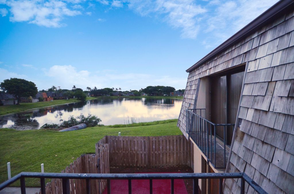 Photo of 327 Lake Arbor Drive, Palm Springs, FL 33461 (MLS # R11019614)