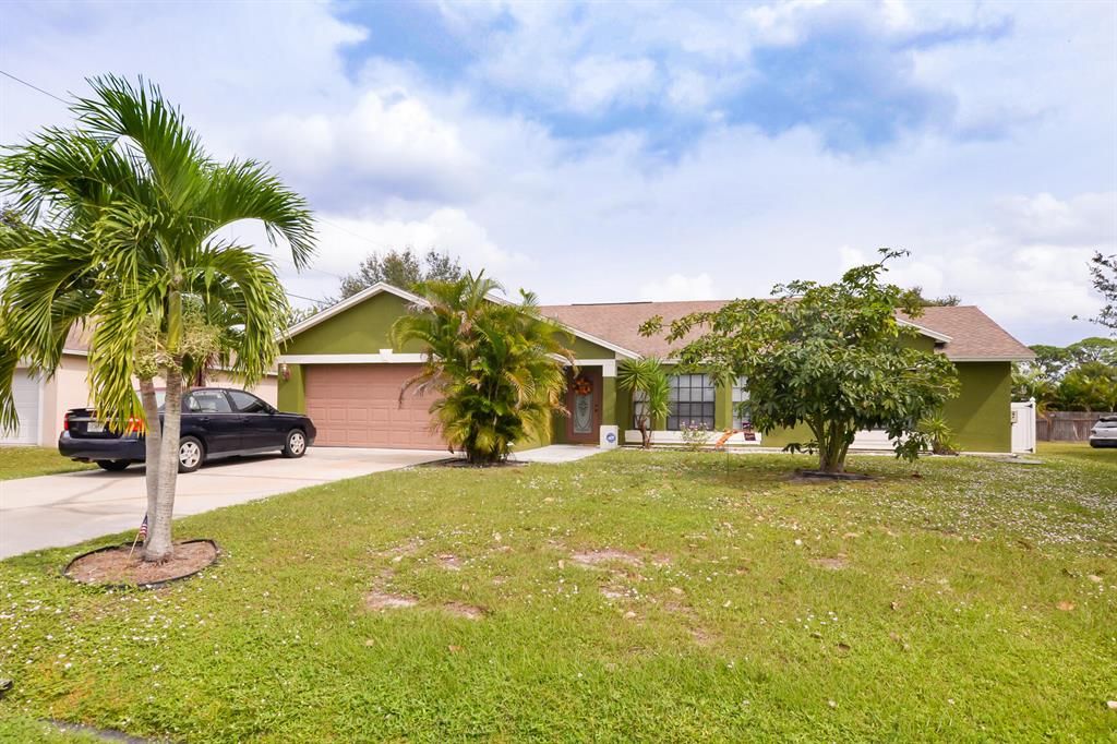 Photo of 1271 SE Sandia Drive, Port Saint Lucie, FL 34983 (MLS # R10756364)