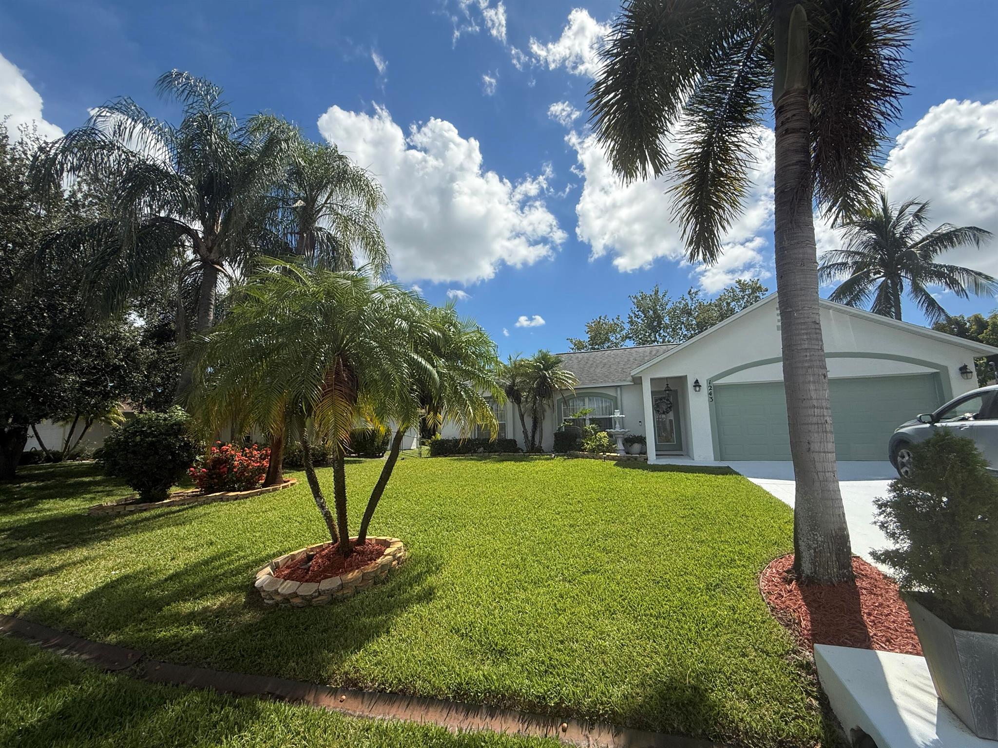 Your Next Home in Port St. Lucie, Florida!This solid CBS single-family home features a new roof, a screened pool for year-round enjoyment, and an open-concept quartz kitchen. It offers 3 bedrooms, including a spacious master suite with direct access to the terrace and pool, 2 full bathrooms, and a 2-car garage. All windows have hurricane accordion shutters for peace of mind, and the property is fully connected to city utilities. Lovingly maintained by its original owner, this move-in ready home is the perfect place to relax, entertain, and enjoy Florida living.