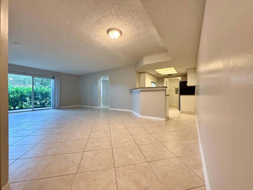 Photo of 5065 Wiles Road #105, Coconut Creek, FL 33073 (MLS # B26045175)