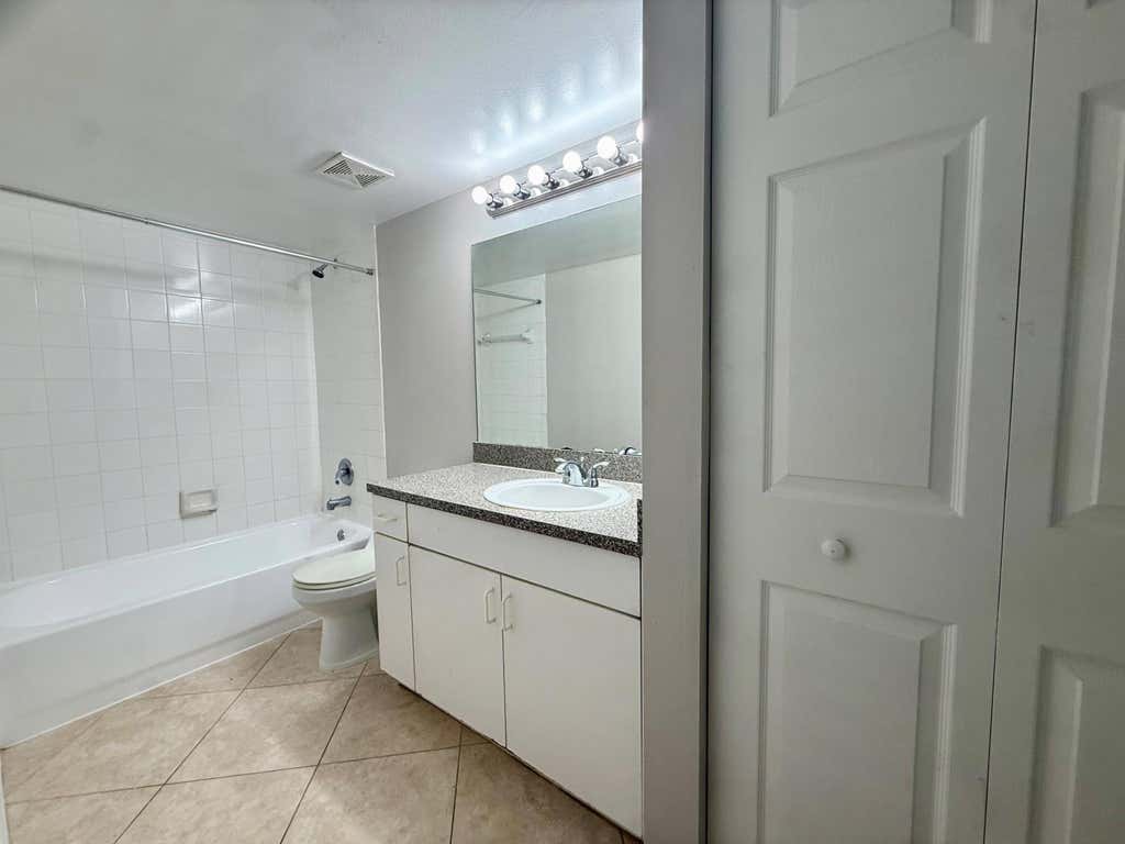Photo of 5065 Wiles Road #105, Coconut Creek, FL 33073 (MLS # B26045175)