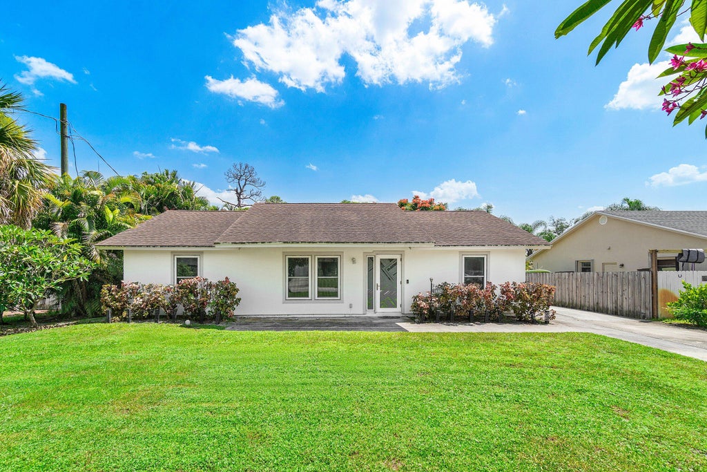Photo of 7442 Canal Drive, Lake Worth, FL 33467 (MLS # B26066210)