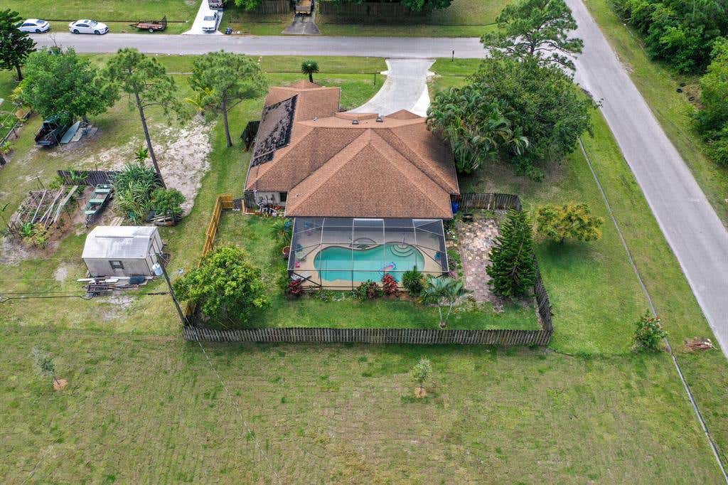 Photo of 381 SW Dwight Avenue, Port Saint Lucie, FL 34983 (MLS # R10786250)