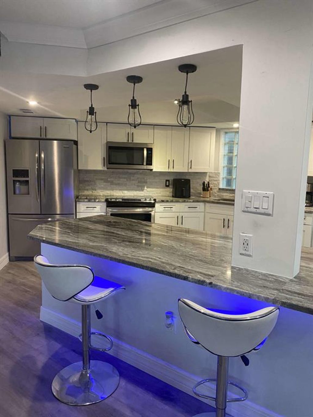 Photo of 11697 Ficus Street #A, Palm Beach Gardens, FL 33410 (MLS # R10709406)