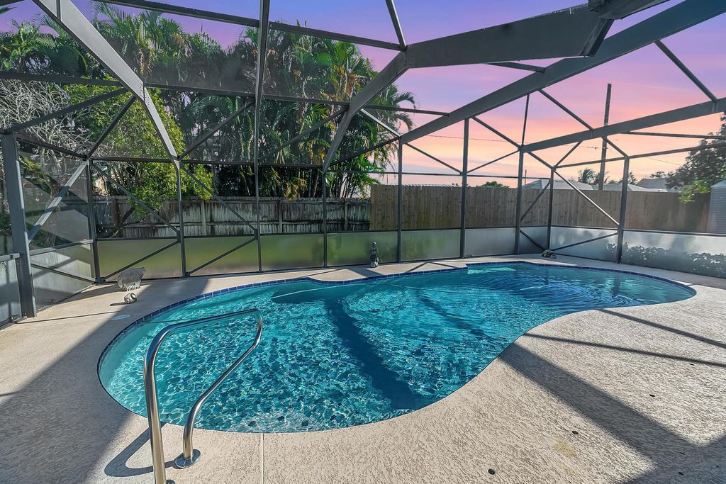 Photo of 859 SE Roulette Lane, Port Saint Lucie, FL 34983 (MLS # R11136808)