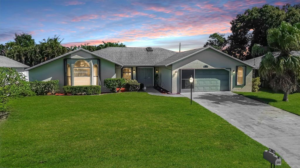 Photo of 859 SE Roulette Lane, Port Saint Lucie, FL 34983 (MLS # R11136808)