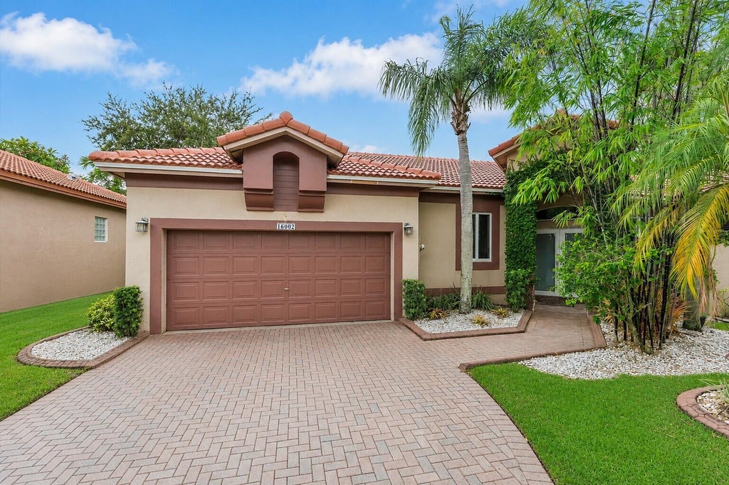 Photo of 16007 OPAL CREEK Drive, Weston, FL 33331 (MLS # B26057975)
