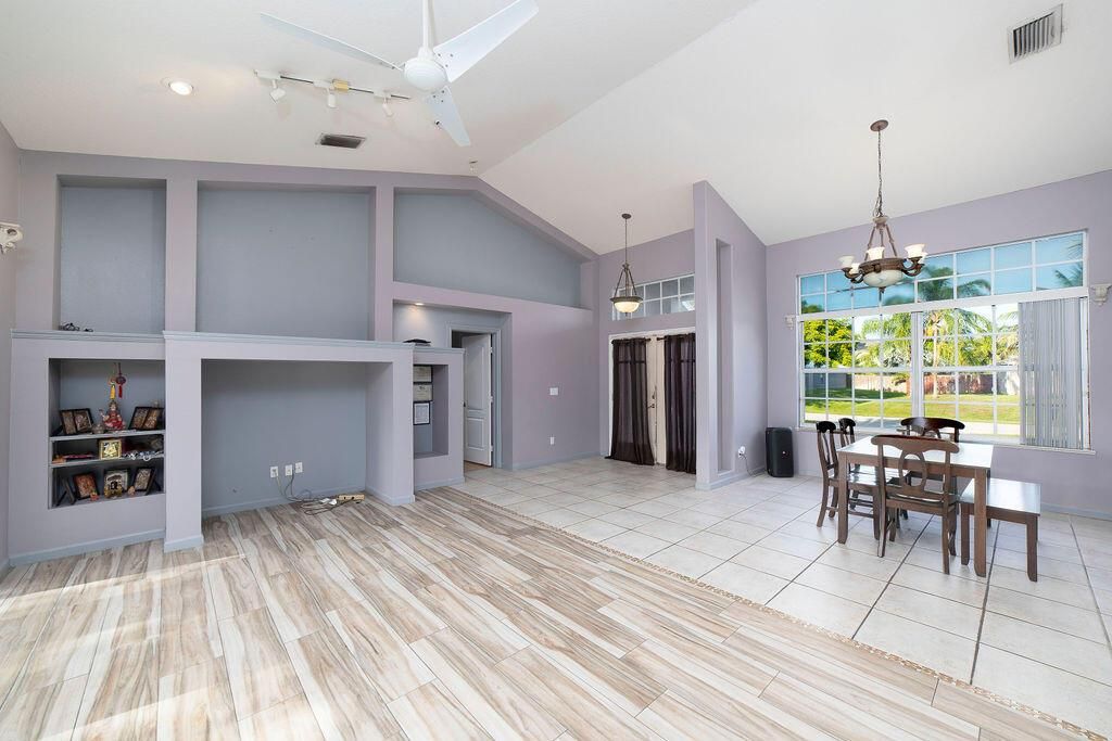 Photo of 4250 SW Allsworth Street, Port Saint Lucie, FL 34953 (MLS # R11011632)