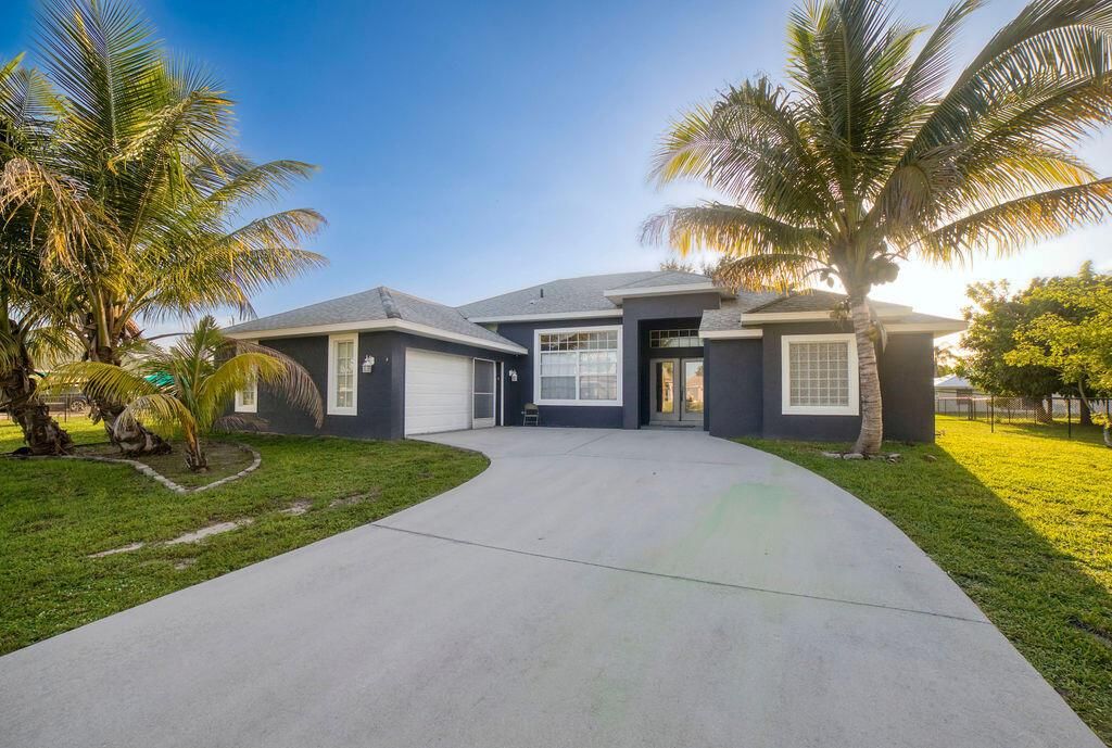 Photo of 4250 SW Allsworth Street, Port Saint Lucie, FL 34953 (MLS # R11011632)