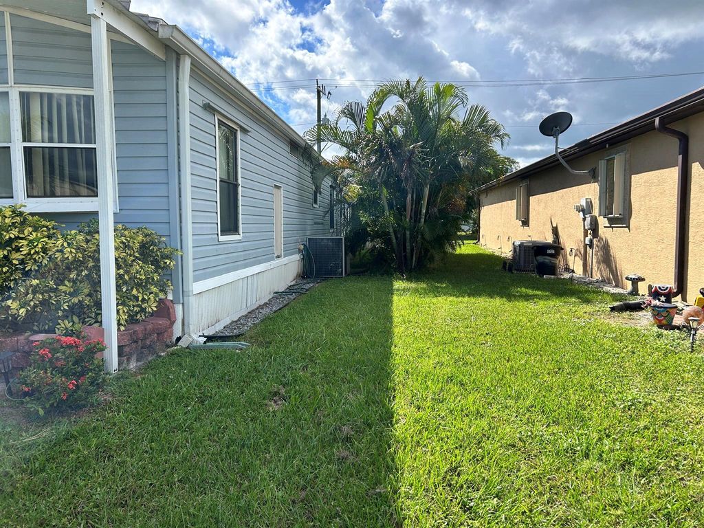 Photo of 18 Arboles Del Norte, Fort Pierce, FL 34951 (MLS # R11135218)