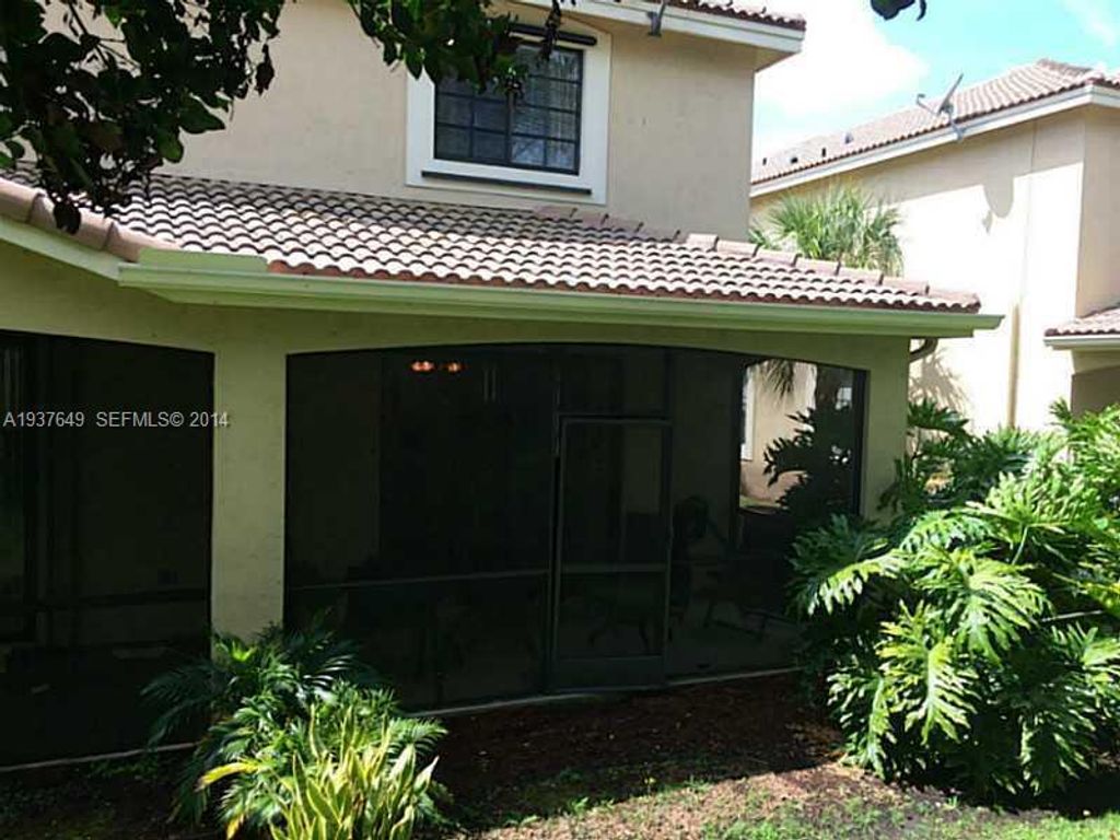 Photo of 3911 Tree Top Drive, Weston, FL 33332 (MLS # B26010300)