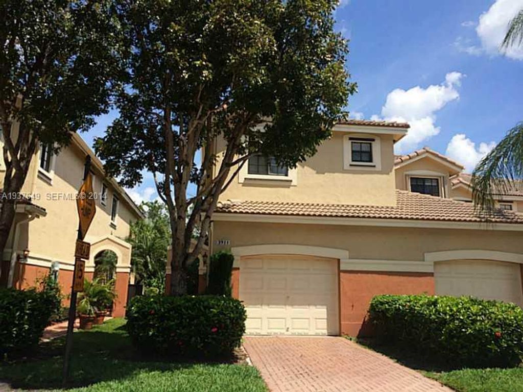Photo of 3911 Tree Top Drive, Weston, FL 33332 (MLS # B26010300)