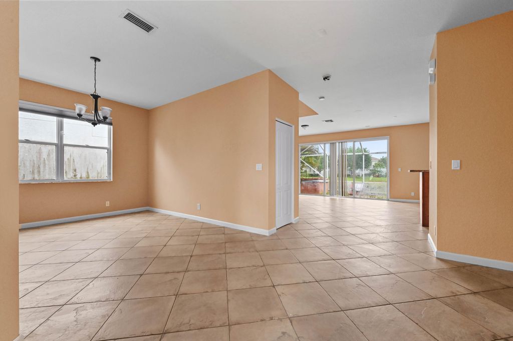 Photo of 116 Hamilton Terrace, Royal Palm Beach, FL 33414 (MLS # B26018107)