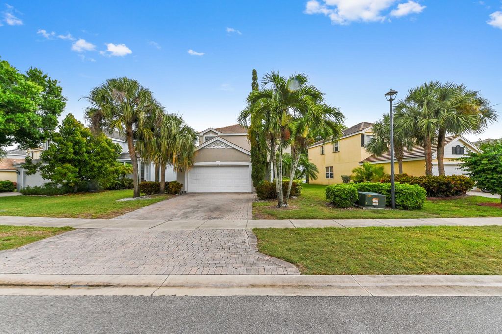 Photo of 116 Hamilton Terrace, Royal Palm Beach, FL 33414 (MLS # B26018107)
