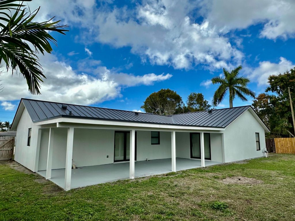 Photo of 436 NW 13th Drive, Boca Raton, FL 33486 (MLS # R11066211)