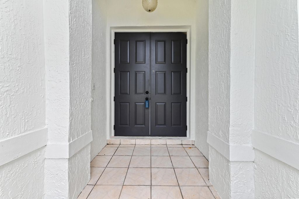 Photo of 5606 NW 109th Way, Coral Springs, FL 33076 (MLS # B26030633)