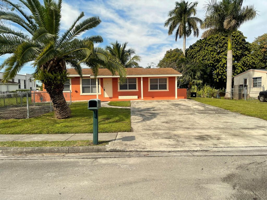 Photo of 130 SW 5th Avenue, South Bay, FL 33493 (MLS # R10962678)