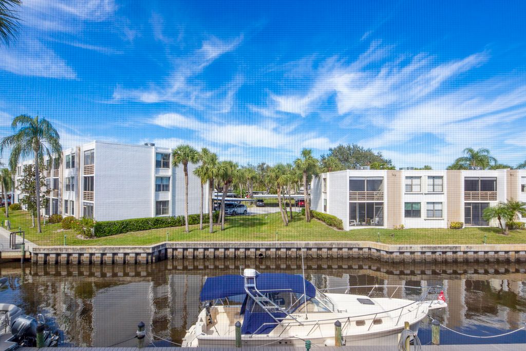 Photo of 1950 SW Palm City Rd #2-206, Stuart, FL 34994 (MLS # R11057121)