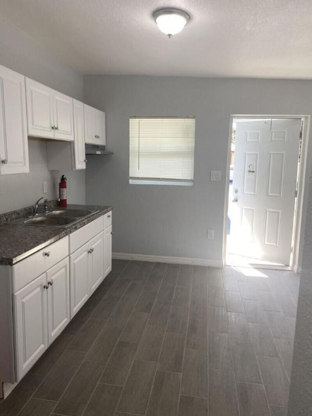 Photo of 250 NW 12th Avenue #1, South Bay, FL 33493 (MLS # R10981414)