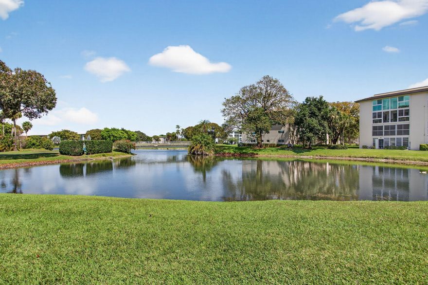 Lovely, bright & well maintained 1bed/1bath FIRST FLOOR in desirable, gated & large Wynmoor 55+ adult Community Martinique Model Building! This unit has the most AMAZING tranquil WATER VIEW! Move in ready with laminate & tiled floors throughout. Walk-in shower. Huge walk-in closet. Complete storm shutters. Roof has recently been replaced. Cable, WIFI, water included!  Martinique Model Building is close to the very active clubhouse! Come & enjoy the Florida lifestyle in the beautiful premier Wynmoor Community, filled with resort-style amenities such as golf course, clubhouse, theater, multiple pools, tennis, pickleball, fitness center, walking paths, social clubs, on site restaurant, library, shuttle bus & more! Centrally located near shopping, restaurants, & airports!  TRULY A MUST SEE!