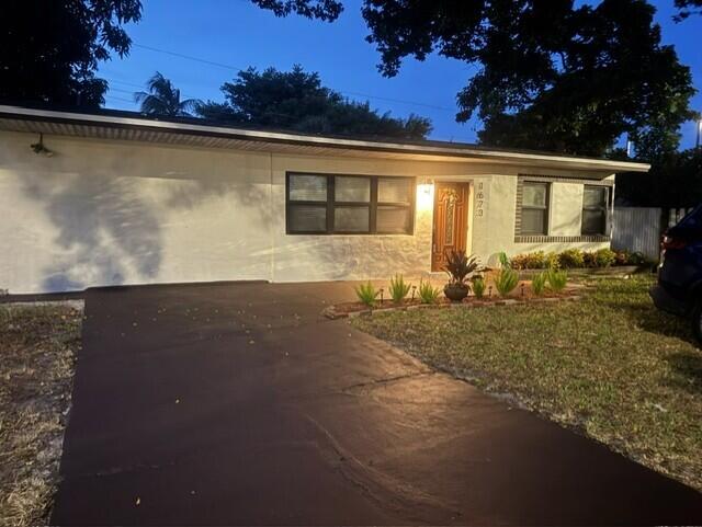 Photo of 1673 NE 31st Street, Pompano Beach, FL 33064 (MLS # B26067213)