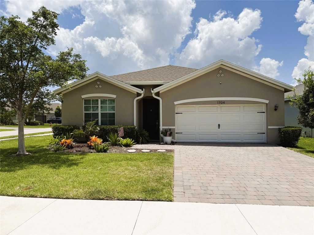 Photo of 1704 NE White Pine Terrace, Jensen Beach, FL 34957 (MLS # F10533295)