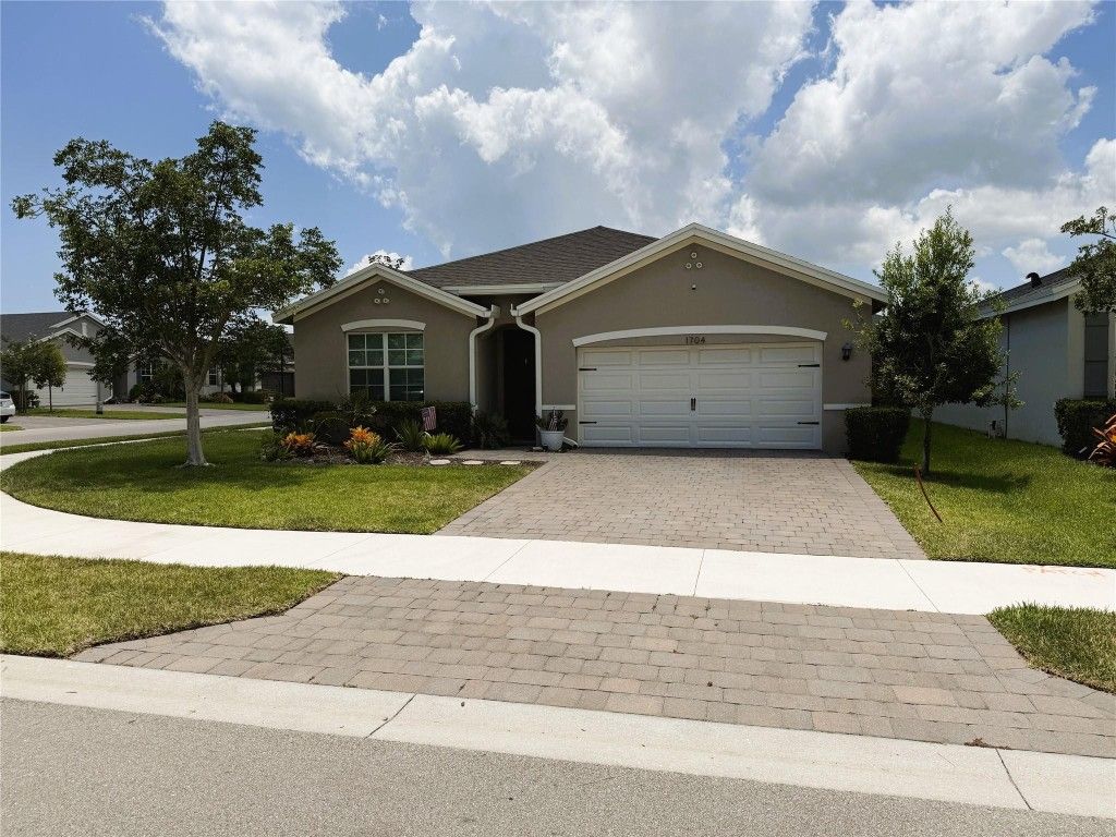 Photo of 1704 NE White Pine Terrace, Jensen Beach, FL 34957 (MLS # F10533295)